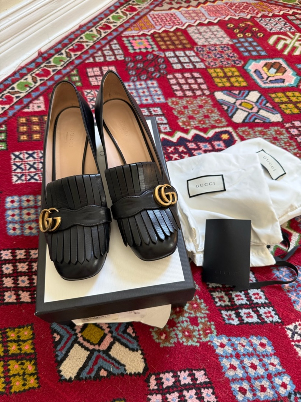 Gucci Black Leather Kiltie Pumps with Gold Double G